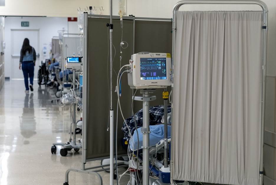 Patients lie on gurneys inside the emergency department at MLK Community Hospital in Willowbrook on Jan. 2.