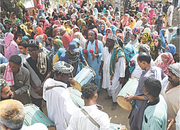 Members of Karachi's Sheedi community, descendants of Africans brought to India as slaves, during the festival at the Mangho Pir shrine in Karachi in April 2018 | AFP