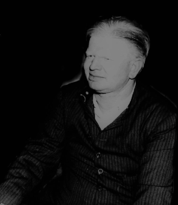 A person in a dark room  AI-generated content may be incorrect.