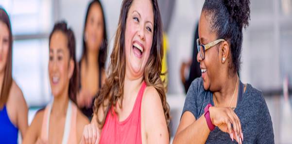 Friends laughing in an exercise class