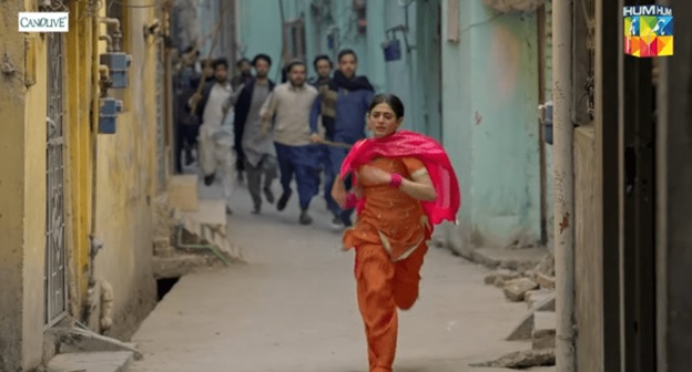 A person running in an alley  AI-generated content may be incorrect.