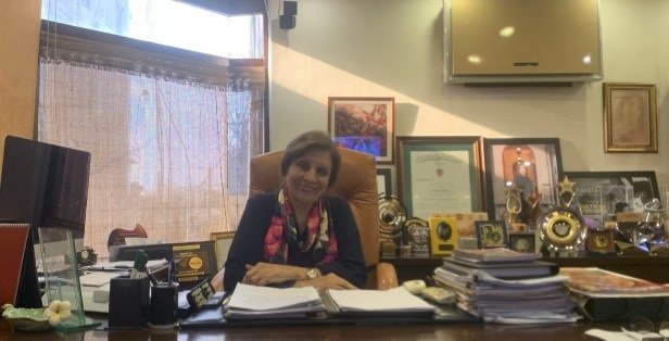 A person sitting at a desk  AI-generated content may be incorrect.