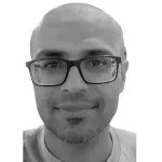 A person wearing glasses  AI-generated content may be incorrect.