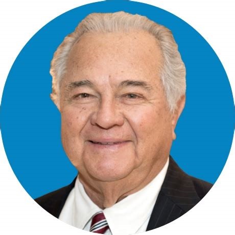 A person in a suit and tie  AI-generated content may be incorrect.