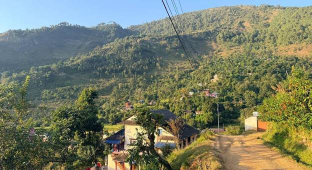 A house in a valley  AI-generated content may be incorrect.