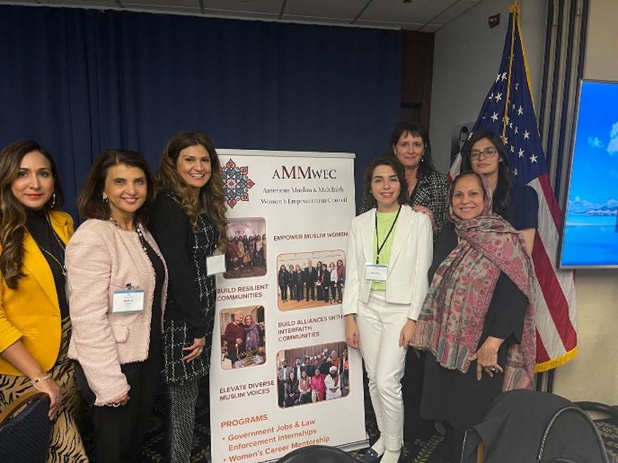A group of women posing for a photo Description automatically generated with medium confidence