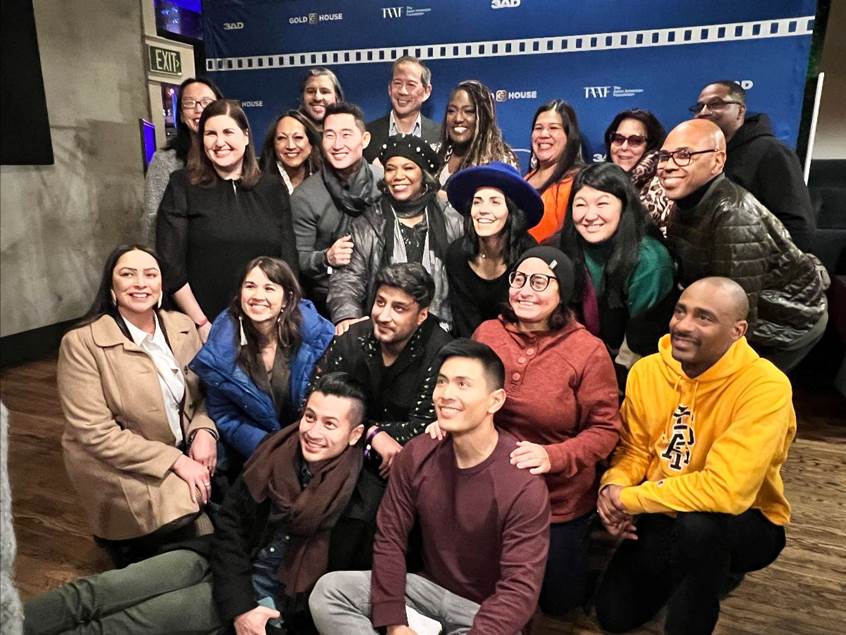 A group of people posing for a photo  Description automatically generated