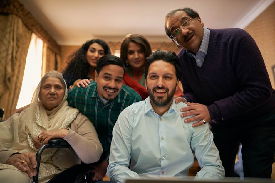 A group of people posing for a photo Description automatically generated