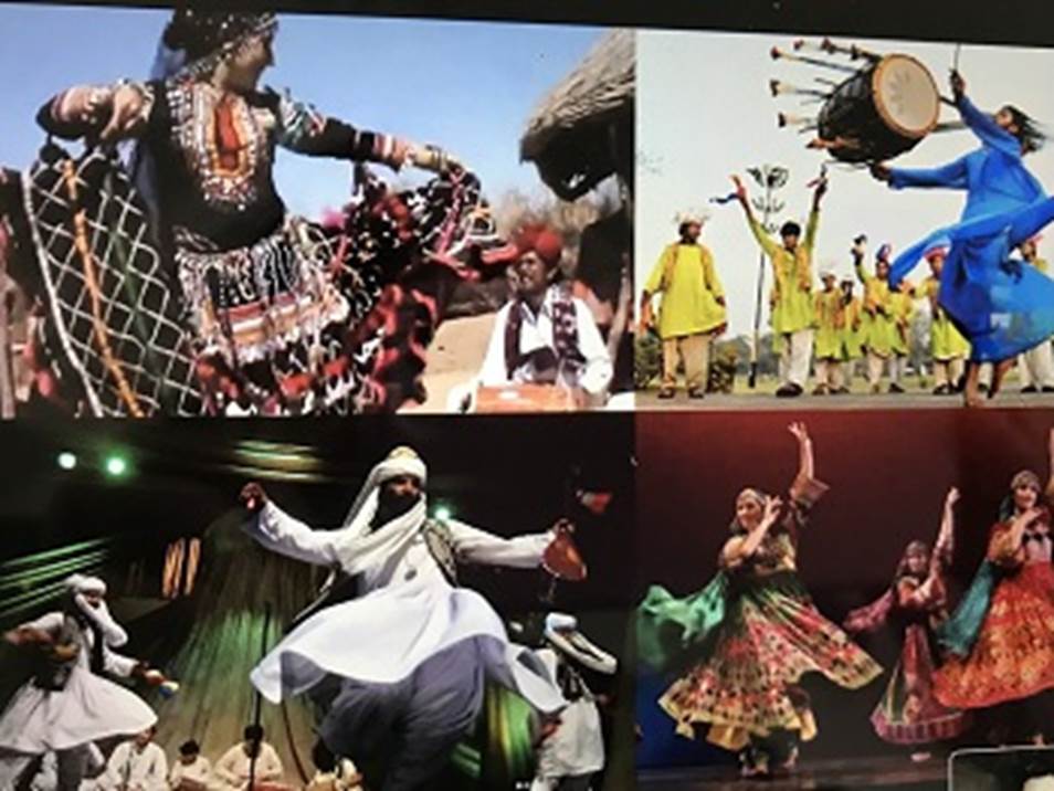 A group of people dancing  Description automatically generated