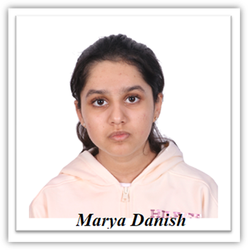 A child with a serious face Description automatically generated