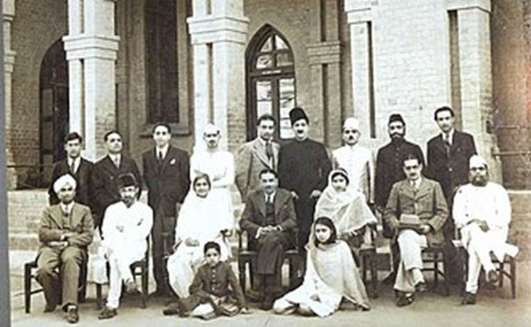 A group of people posing for a photo Description automatically generated