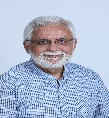 A person with white hair and beard  AI-generated content may be incorrect.