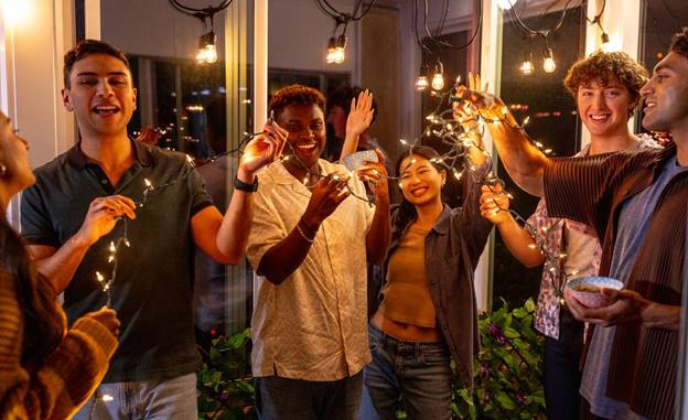 A group of people holding lights  AI-generated content may be incorrect.