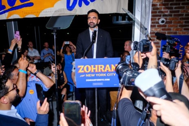 a man looking at a camera