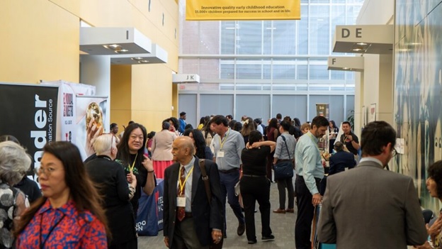 A group of people in a room  AI-generated content may be incorrect.