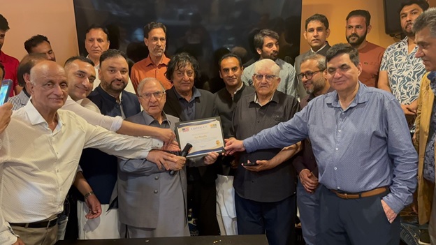 A group of men holding a certificate  AI-generated content may be incorrect.