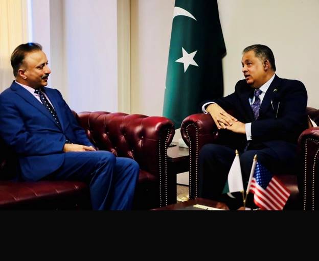 Two men in suits sitting in chairs  AI-generated content may be incorrect.