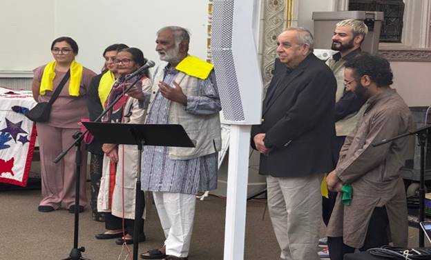 A group of people standing in front of a podium  AI-generated content may be incorrect.