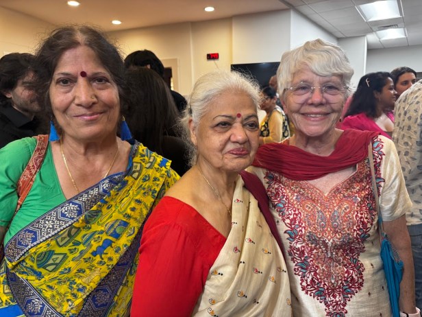 A group of women smiling  AI-generated content may be incorrect.