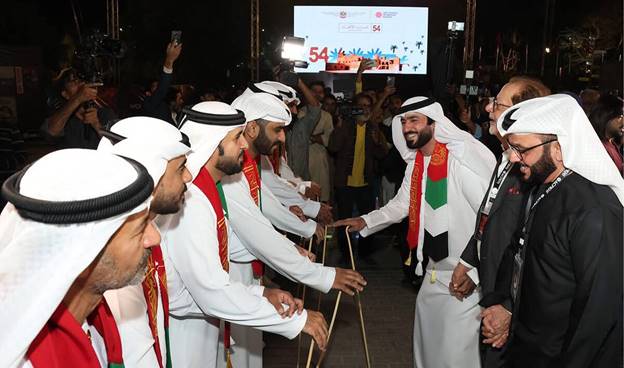 A group of men in white robes  AI-generated content may be incorrect.