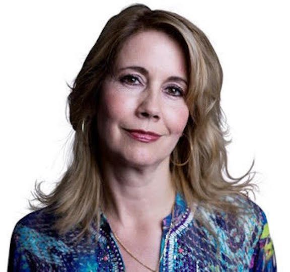 A person with blonde hair Description automatically generated with medium confidence