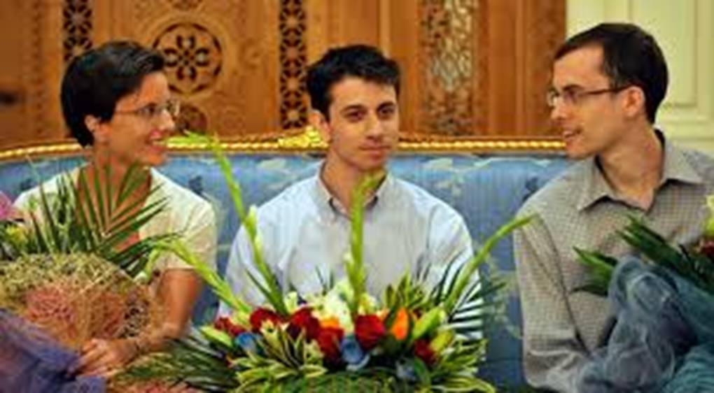 Freed U.S. hikers returning Sunday