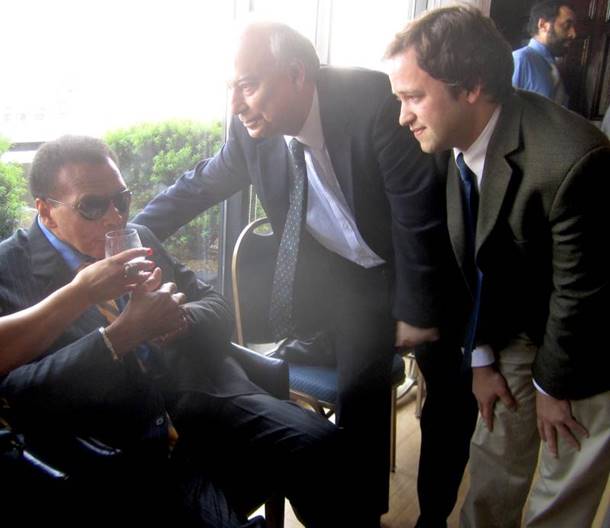 A group of men in suits  AI-generated content may be incorrect.