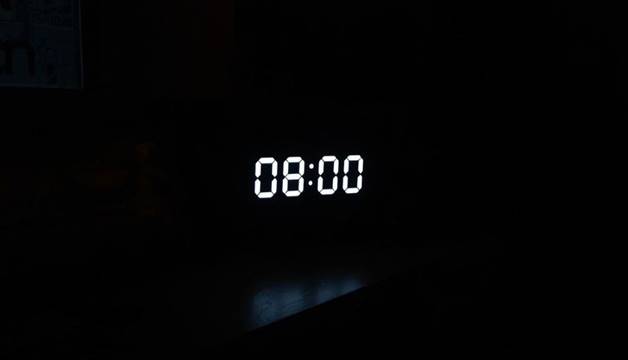 A digital clock with numbers  AI-generated content may be incorrect.