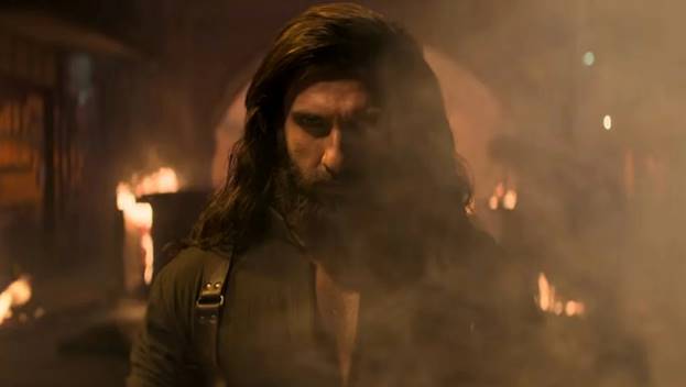 A person with long hair and a beard  AI-generated content may be incorrect.