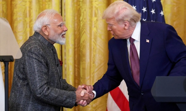 US President Donald Trump and Indian Prime Minister Narendra Modi shake hands as they attend a joint press conference at the White House in Washington, DC, US, February 13. &mdash; Reuters